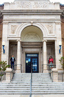 Whimsical portraits of a sassy woman in a red leather jacket outside the Presidio Library in San Francisco