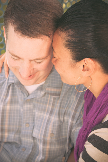 Authentic tender moment shared between man and woman in East Bay.