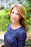 Headshot portraits of a blonde woman wearing a blue dress outside of the Presidio Library in San Francisco