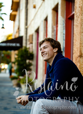 Authentic senior photos of young man in blue shirt in Sarasota FL